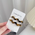 Vintage tortoiseshell acetate wavy hair clips set on a fashion jewelry display card - Leopard Print