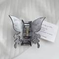 Pinza per capelli a farfalla con motivo marmorizzato grigio e molla in metallo dorato - 7cm x 4,5cm / Nero