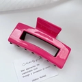 Vibrant rose pink acetate hair claw clip with glossy finish and rectangular hollow design - Brown And Rose Pink