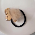 Cute amber acrylic rabbit hair tie with a beige fluffy pompom and black elastic band - Caramel