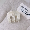 Detail view of small marbled cream acetate hair claw clip with elegant swirl pattern - 35# Cream Beige Marble Fat M-Claw Style (2.5cm)