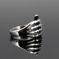 Gothic punk skeleton hand ring in vintage titanium steel with cool silver metallic finish - US 7 / Antique Silver