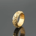 Anello rotante vintage in acciaio dorato con simboli di mantra buddisti incisi - Oro