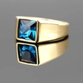 Classic gold titanium signet ring featuring a square cut deep blue gemstone - Gold Tone Blue Eye