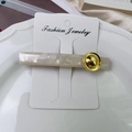 Elegante fermaglio per capelli in acetato marmorizzato con fibbia in metallo dorato - Bianco