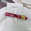 Elegante molletta per capelli in marmo rosso con fibbia in metallo dorato - Rosso