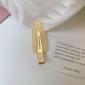 Pale yellow acetate hair clip with a gold metal duckbill base for women's styling - Orange