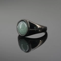 Minimalist black steel ring featuring a round light green aventurine stone inlay - Black Base Aventurine