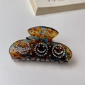 Artistic tortoiseshell acetate hair claw clip with sparkling rhinestone smiley faces - Brown