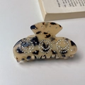 Tortoiseshell acetate hair claw clip with sparkling rhinestone smiley face designs - Light Leopard