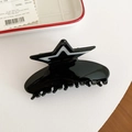 Glänzende schwarze Stern-Haarklammer mit weißen Konturen für elegantes Styling - Schwarz