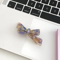 Chic acetate hair clip with colorful marble pattern and elegant bow design for women - Floral Purple