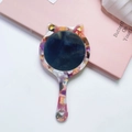 Cat-shaped makeup mirror with colorful marble acetate texture and golden paw detail - Mixed Color