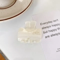 Elegant cream acetate bow hair claw clip with Barrette La Prance engraving for women - White