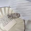 Close-up of marble pattern hair clip with rhinestone LOVE letters and heart gem - 6# Ink Gray