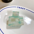 Minimalist square acetate hair claw clip with green and white marble texture finish - Cyan