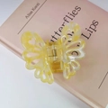 Elegante molletta per capelli a farfalla gialla in acetato con trama marmorizzata - Giallo