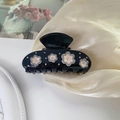 Eleganter schwarzer Haarklammer mit weißen Blumen und funkelnden Strasssteinen - Schwarz