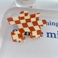 Brown and cream checkered puzzle shape hair claw clip with high-gloss finish - Brown