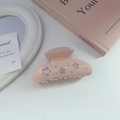 Pink star-shaped acetate hair claw clip with rhinestones shown on a white tabletop - 3# Pink & White Star