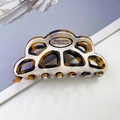 Elegant cutout acetate hair claw clip with cream and brown tortoiseshell pattern - White + Leopard