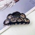 French style matte black hair claw clip with tortoise shell pattern and gold lettering - Black + Light Leopard