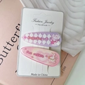 Detail of pink and purple bunny hair clips with glitter finish on a white display card - 4# Rabbit 2-piece Set