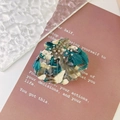 Shell shaped marble acetate hair claw clip with rhinestones on a decorative background - 3# Green
