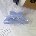 Detail view of the lavender purple glitter butterfly hair claw clip for elegant styling - Blue