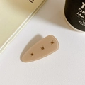 Beige matte acetate hair claw clip with amber rhinestones on a white leather surface - Side Clips / Shimmer Pink