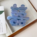 Detail of blue marble acetic acid hair claw with Chinese Xi character and gold handmade logo - Blue