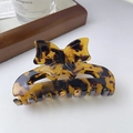 Elegant tortoiseshell bow hair claw clip made of high-quality acetate resin finish - Leopard Print