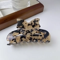 Elegant tortoiseshell acetate hair claw clip featuring a 3D bow design for women - Light Leopard
