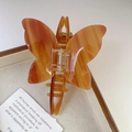 Haarklammer in Schmetterlingsform aus Acetat mit Bernsteindesign für elegante Frisuren - Schmetterlingsform (FZ713) / Karamell