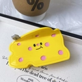 Cute yellow cheese-shaped hair claw clip with cartoon expression and small animal detail - Yellow