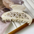 Luxurious cream marble claw clip with sparkling brown rhinestones and hollow mesh design - Beige