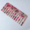 Square acetate hair comb with pink, beige, and black geometric patterned wide teeth - Red Black