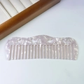 Detail of marble texture acetate hair comb with hollowed heart patterns and smooth teeth - Thickness 3mm / 5# White