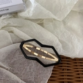 Star-shaped hair clip in black and gold metallic finish for girls and women - Gourd Style / Gourd Black