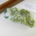Elegante molletta foglia di loto verde in acetato con accenti di strass bianchi - Rana Loto Sfumato Verde Menta