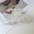 Elegant hollow butterfly hair claw clip in pearlescent cream white finish - Pearlescent White