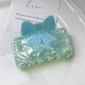 Pince à cheveux élégante en acétate vert clair avec nœud bleu et strass brillants - Marbre Cyan