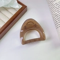 Elegant amber brown hollow triangular hair claw clip with a glossy translucent finish - Brown