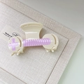 Haarklem van acetaat in crème en lichtpaars met sterdetail voor dames - Crèmeroze