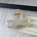 Elegant cream white bow hair claw clip made of glossy acrylic for women's hairstyle - White