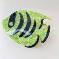 Close-up of green marble acetate fish hair claw clip with black striped tropical pattern - Green