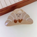 Simpatica molletta per capelli a forma di croissant in acetato marrone con smile - Cornetto