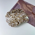 Elegant spiral shell hair claw clip with brown marble pattern and golden metallic trim - Striped Shell