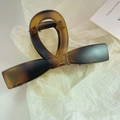 Large tortoiseshell resin hair claw clip featuring a classic bow design and metal spring - Matte Yellow