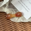 Fermaglio per capelli a fiocco in resina ambrata con finitura in acetato vintage - Caffè Chiaro